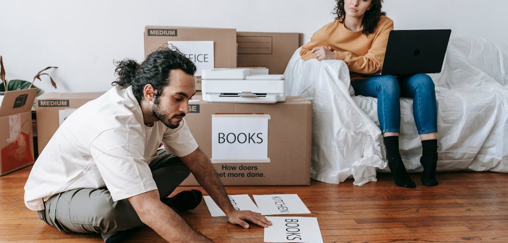 Couple labeling storage boxes.